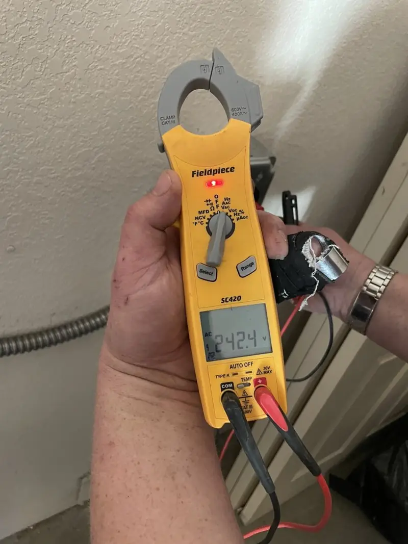 Voltage testing with clamp meter during Aluminum Wiring Replacement in Galena